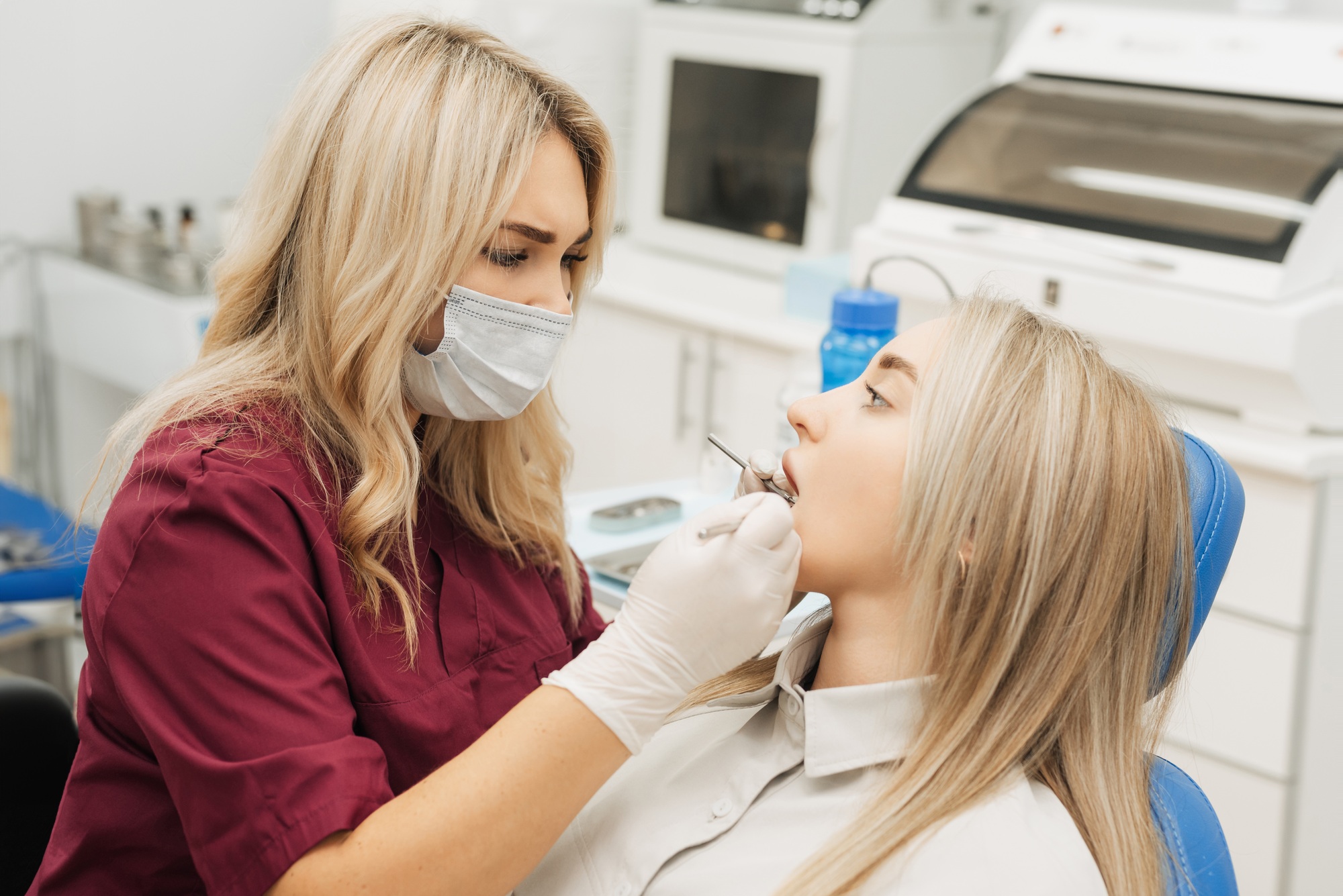 Dentist examining a patient's teeth in the dentist.